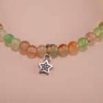 Close-up of 4mm chalcedony beads and star charm detail