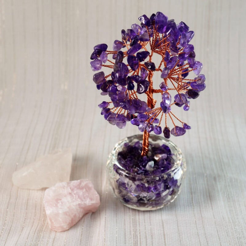 Amethyst Money Tree displayed on a desk beside crystals