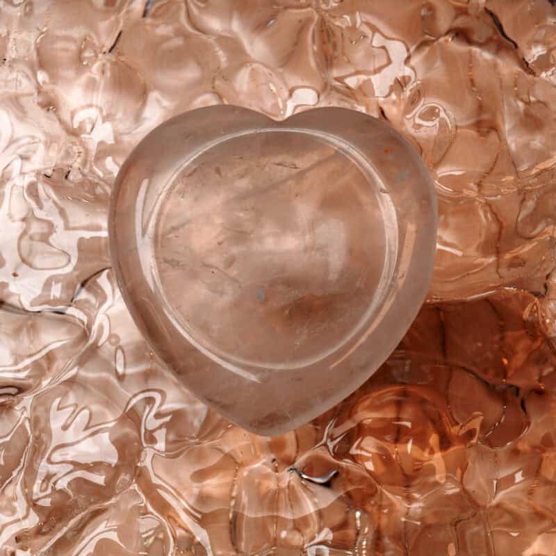 Heart-shaped clear quartz crystal worry stone