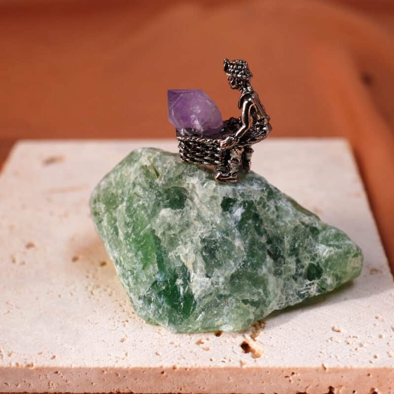 Close-up of raw Fluorite cluster in miner's basket