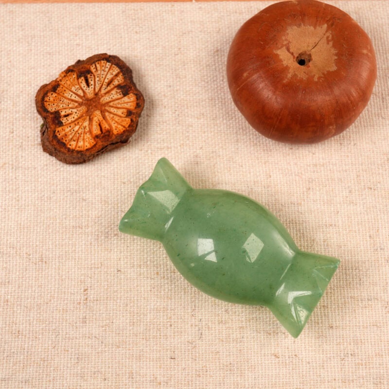 natural-green-onyx-candy-figurine-03-scaled.jpg" alt="Natural Green Onyx Candy Figurine displayed in natural light, showing its rich green color and smooth polished surface