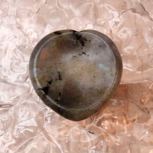 Heart-shaped labradorite crystal with iridescent flash
