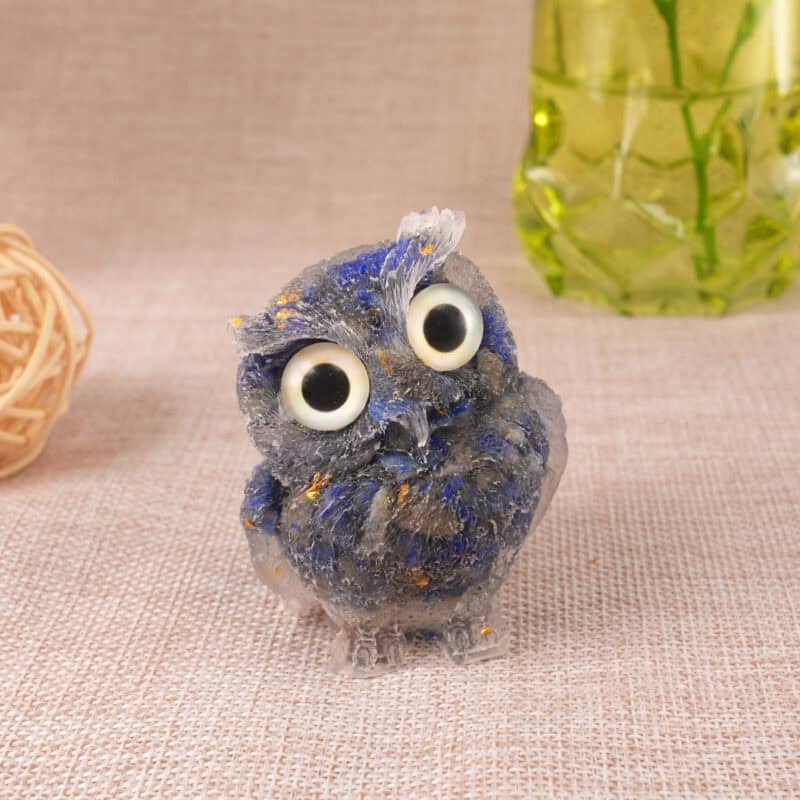 Lapis Lazuli resin owl figurine standing upright on white background