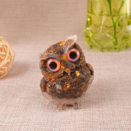 Tiger Eye owl figurine crafted in resin, displayed on a clean white background