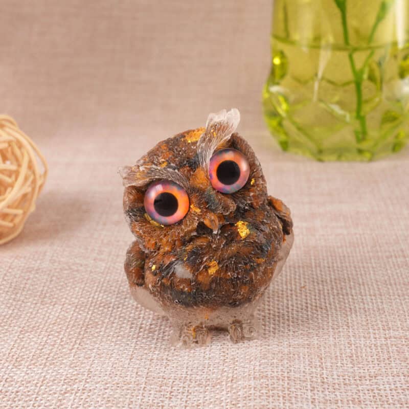 Tiger Eye owl figurine crafted in resin, displayed on a clean white background