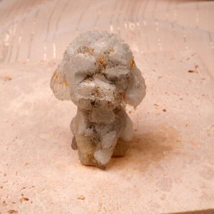 Natural Resin White Turquoise Dog Figurine displayed on a wooden surface, showing detailed carving and white turquoise accents