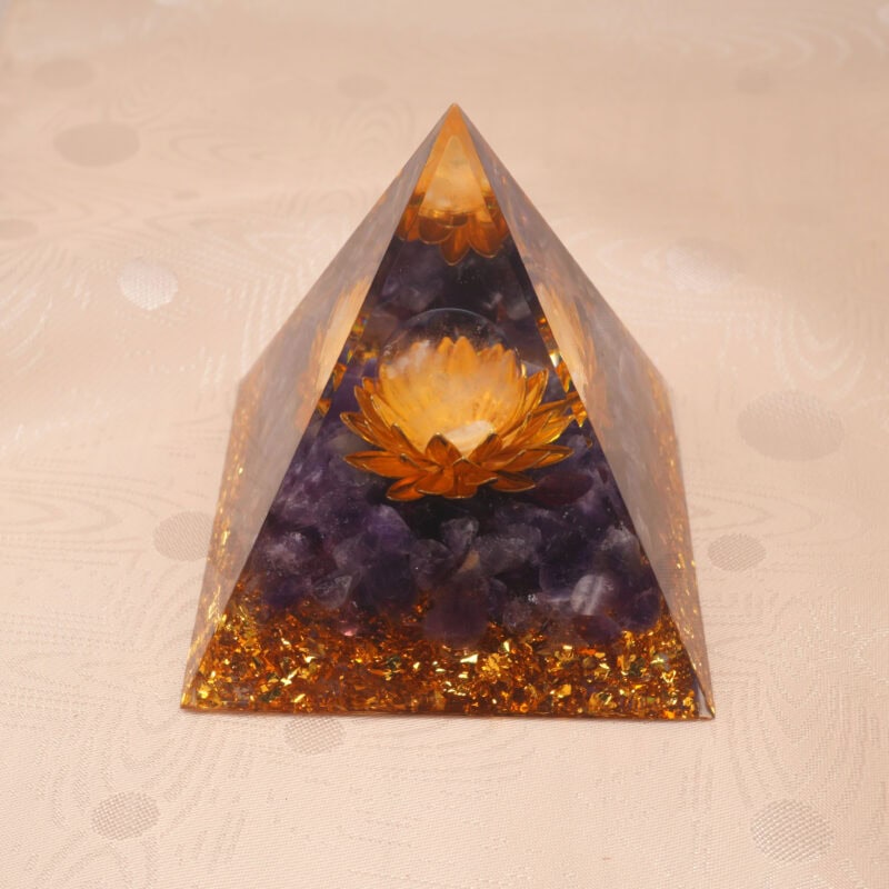Clear quartz and amethyst resin pyramid for spiritual healing and energy cleansing