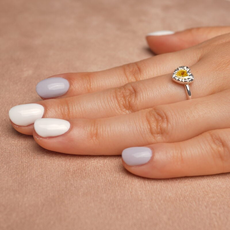 Hand wearing Yellow Gemstone Ring with vibrant yellow zircon set in polished S925 sterling silver, highlighting its elegant design on the finger