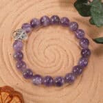 Amethyst bracelet in natural light showing rich purple tones.