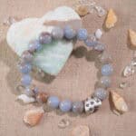 Cream chalcedony bracelet placed in natural light with neutral background.