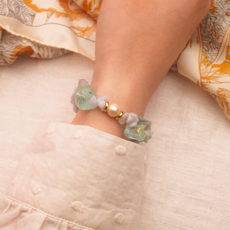 The Cancer zodiac bracelet worn on the wrist, radiating gentle elegance with soothing crystal tones.