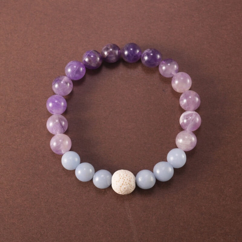 Handmade lava stone bracelet with dream amethyst and blue chalcedony beads.
