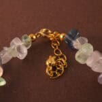 Detailed view of the Sagittarius bracelet highlighting the natural textures and subtle glow of fluorite, pearl, and aquamarine stones.