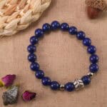 Lapis lazuli S925 bracelet under natural light with specks of gold.