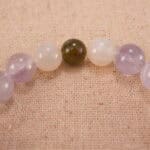 Close-up of lavender amethyst and white chalcedony bracelet with S925 silver.
