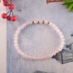 Rose quartz bracelet in daylight showing gentle clarity.