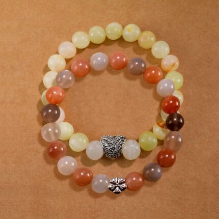 Main image of stacked Afghan jade and moonstone bracelets as a set.