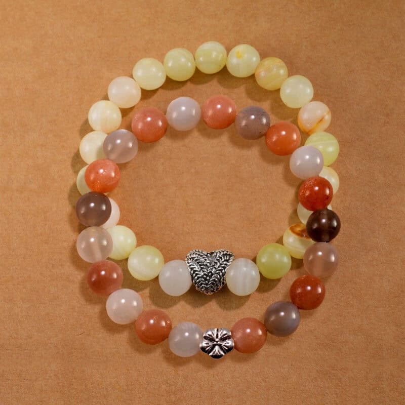 Main image of stacked Afghan jade and moonstone bracelets as a set.