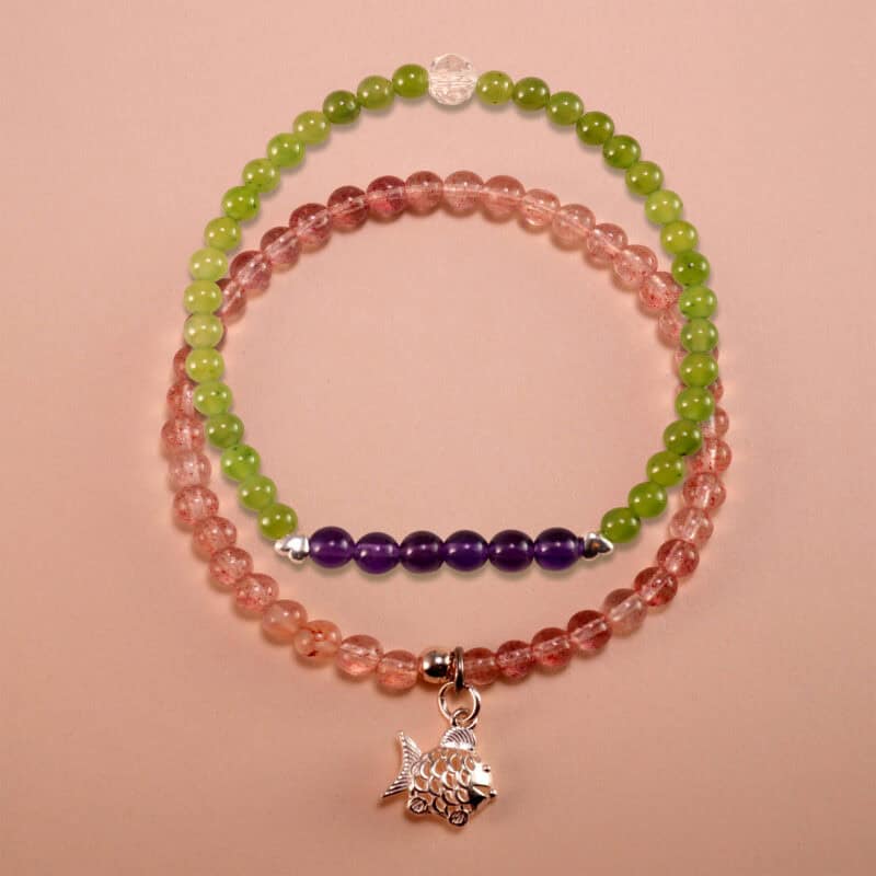 Main image of stacked green chalcedony, amethyst and strawberry quartz bracelets.