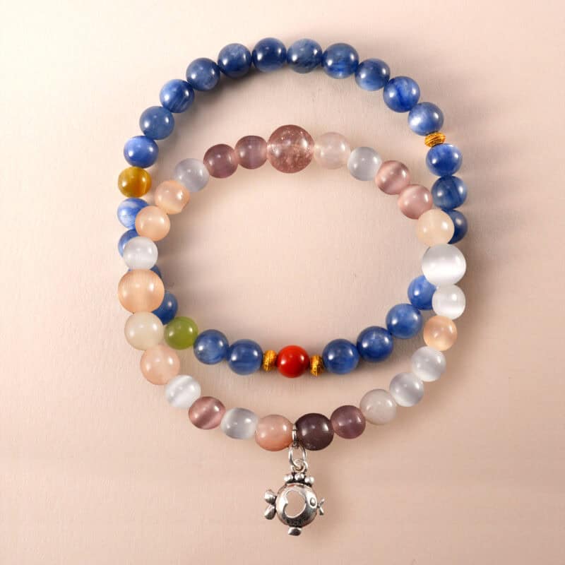 Main image of stacked bracelets in bold and soft gemstone mix.