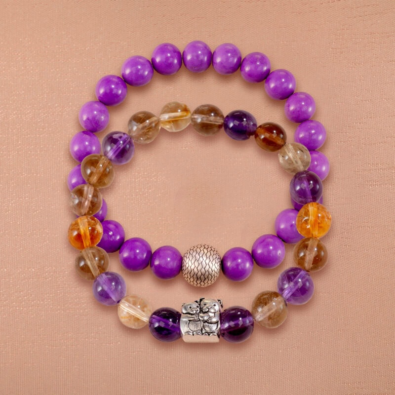 Main image showing stacked phosphosiderite and ametrine bracelets as a set.
