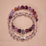 Main product image of stacked bracelets with purple phantom and clear quartz.