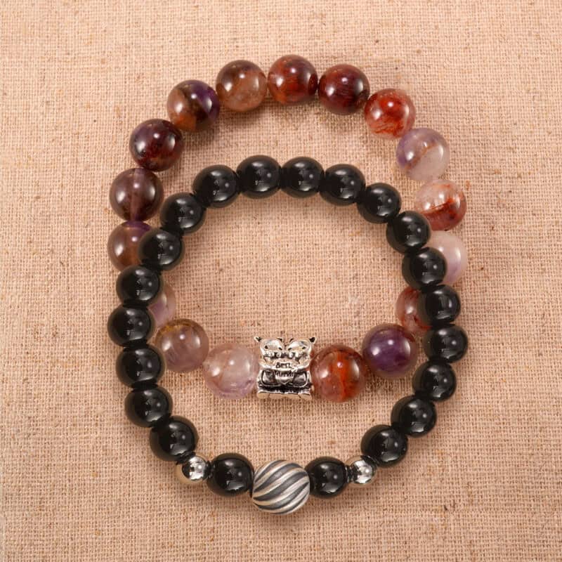 Main image of stacked purple phantom and obsidian bracelets with S925 silver.