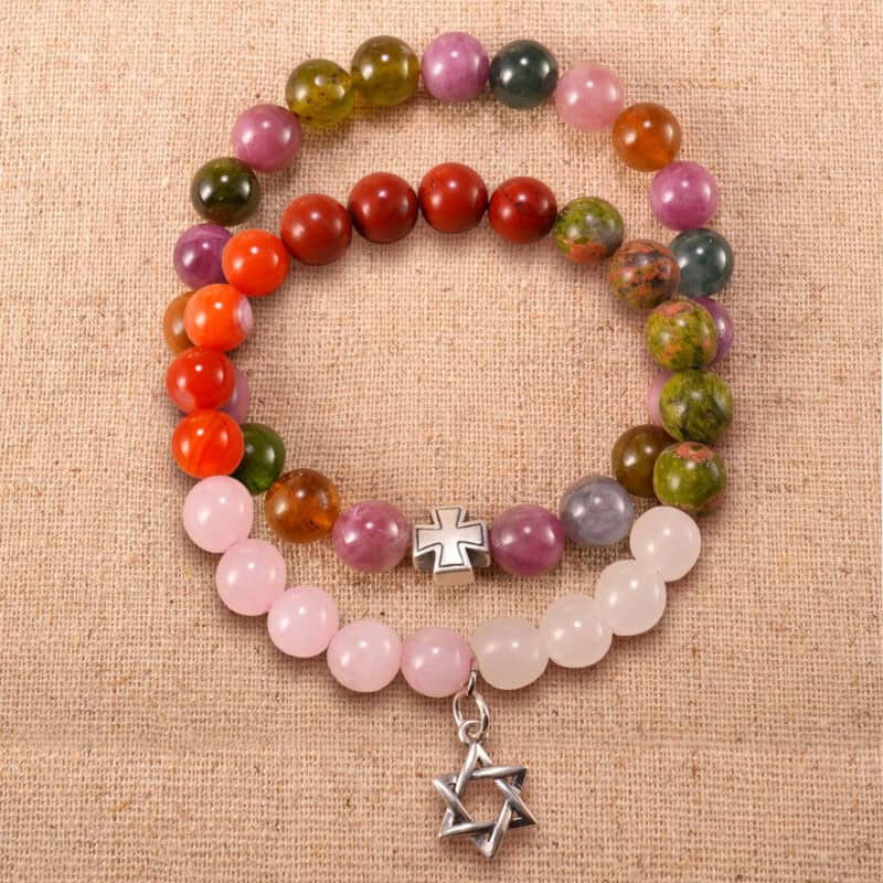 Main image of stacked gemstone bracelets: red jasper mix and tourmaline.