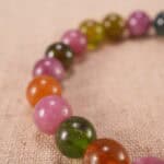 Close-up of tourmaline bracelet with S925 silver highlights.