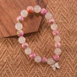 White chalcedony and rainbow fluorite bracelet in natural light.