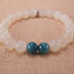 Close-up of white moonstone and blue apatite bracelet with S925 silver beads.