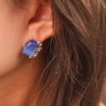Model wearing the blue cat’s eye studs, subtly elegant and perfect for everyday wear.