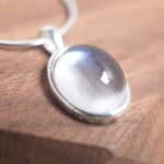 Close-up of moonstone pendant details with iridescent sheen
