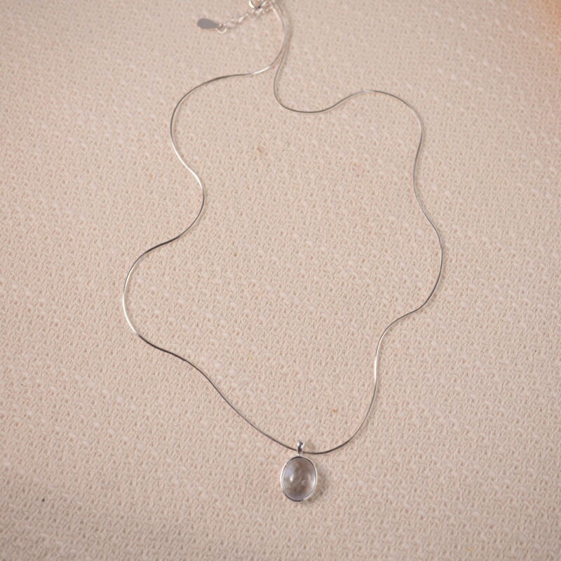 Moonstone pendant on white background