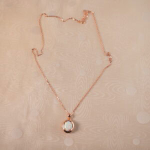Opal pendant on white background