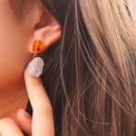 Model wearing the yellow-green chalcedony raw quartz earrings, creating a fresh and eye-catching look.