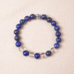 Lapis lazuli and clear quartz bracelet with silver accent, symbolizing calmness, clarity, and open communication.