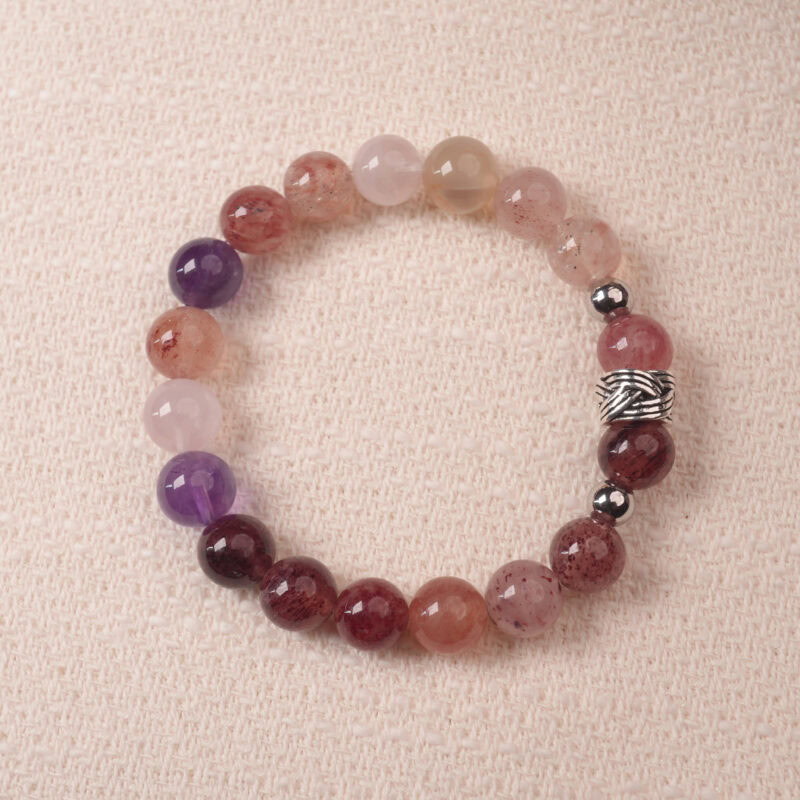 Strawberry quartz and amethyst bracelet with natural pink and purple tones, symbolizing love and positivity.