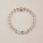 Clear Quartz beaded bracelet with a textured silver bead – main product image.