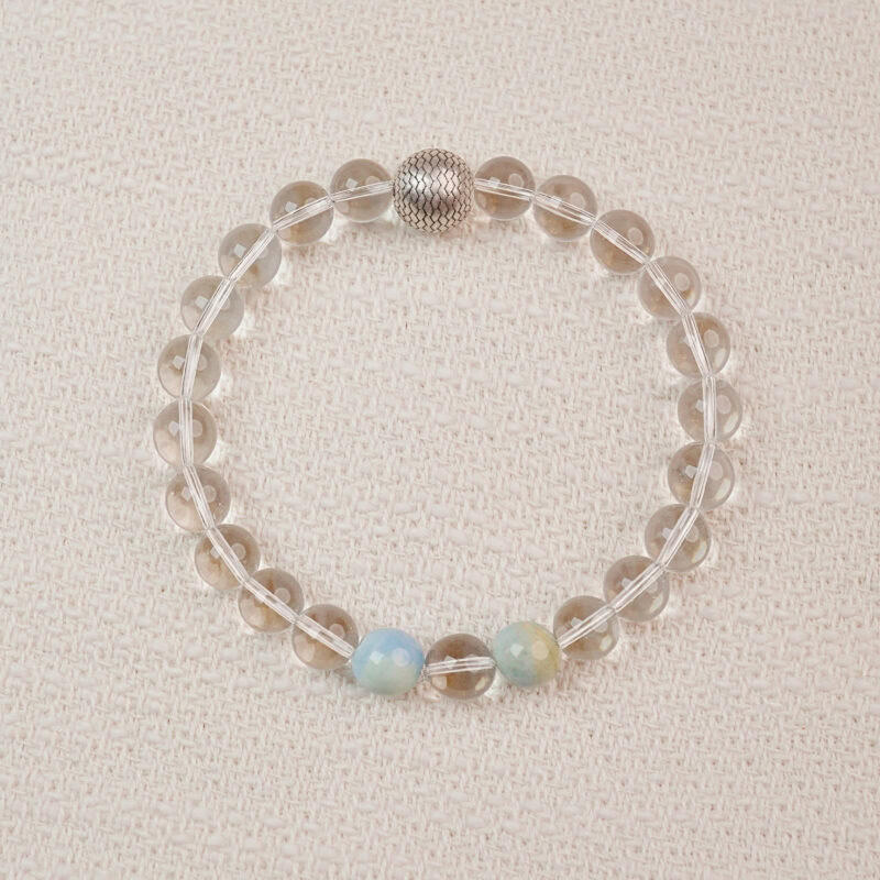 Clear Quartz beaded bracelet with a textured silver bead – main product image.