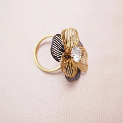 Stainless steel flower ring with large clear stone – main product image