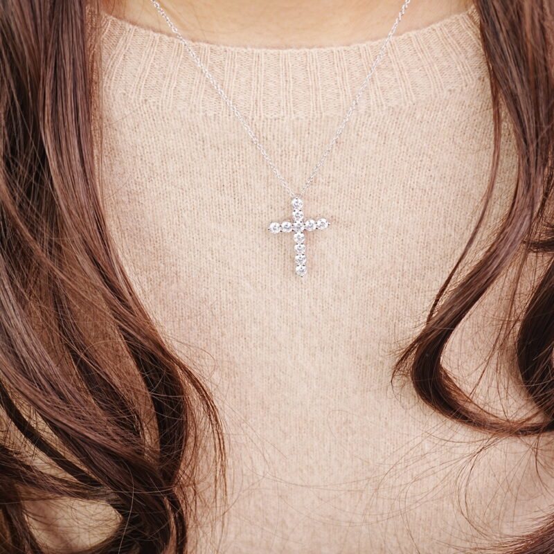 Woman wearing 925 sterling silver moissanite cross necklace – wear shot