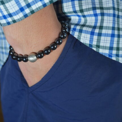 Bracelet worn on wrist with neutral clothing, showing minimalist daily style