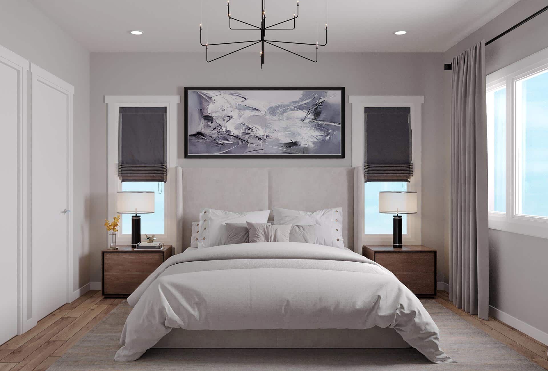 Spacious modern bedroom with neutral decor, large windows, contemporary artwork, and stylish nightstands for a luxurious living space.