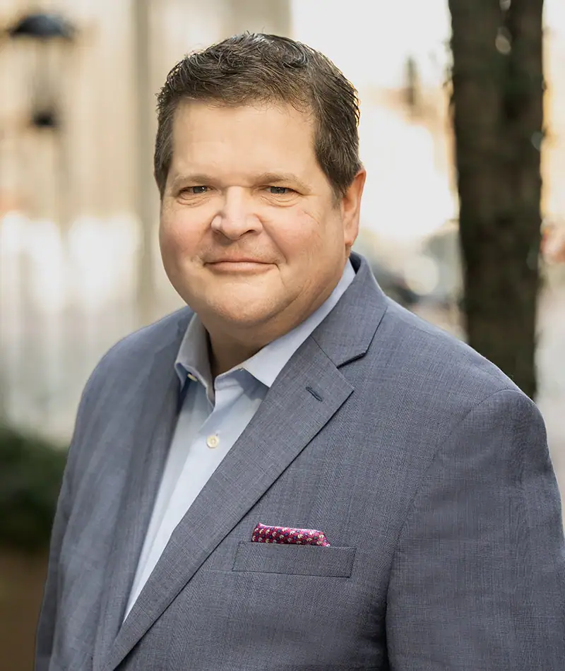 Headshot of James A. Fischer, New England Development