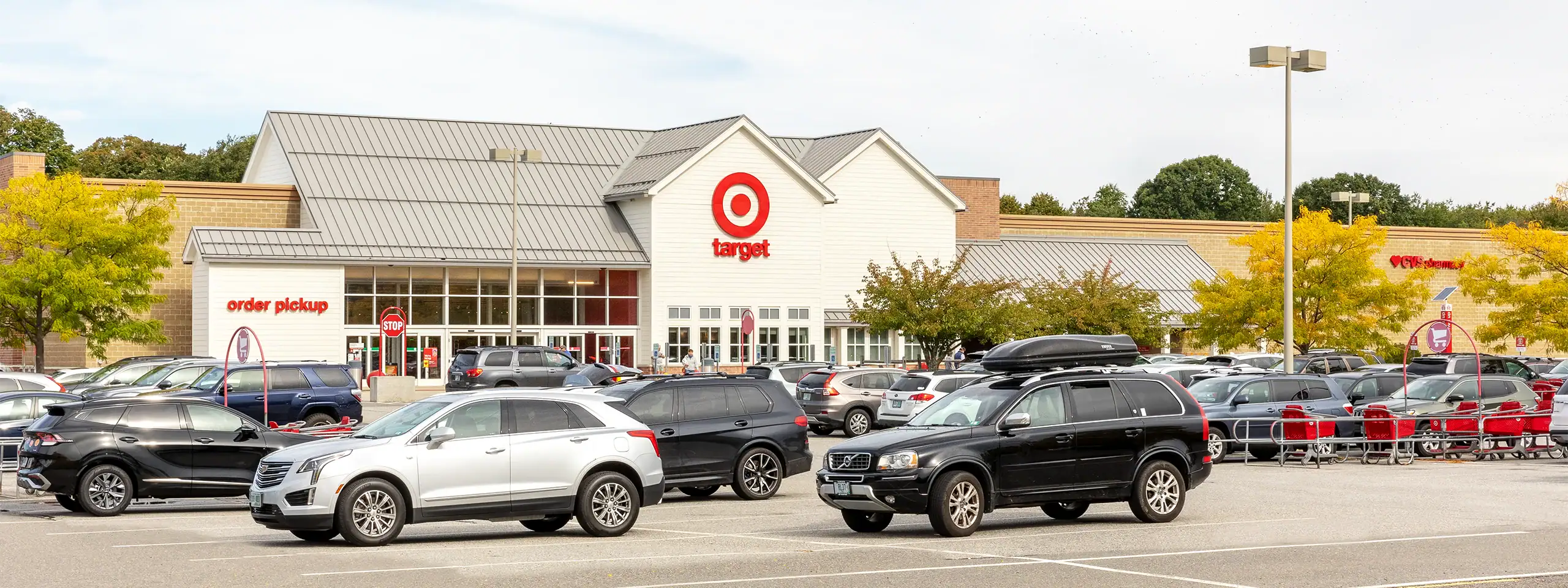 Target store with parking lot and shopping carts in front.