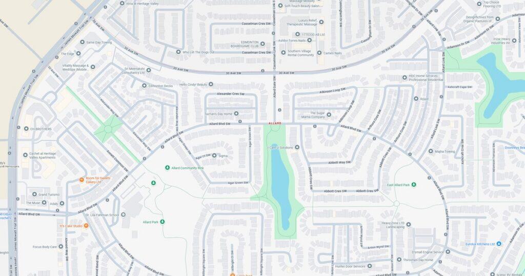 Detailed map showing streets, green spaces, and water bodies in a suburban community.