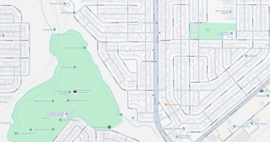 Map of Sunset Park with nearby green areas, pathways, and public transportation options in a detailed urban layout.