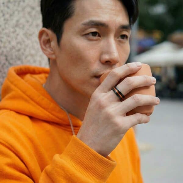 Mens black and orange band – tungsten ring for men with personalised custom engraving.