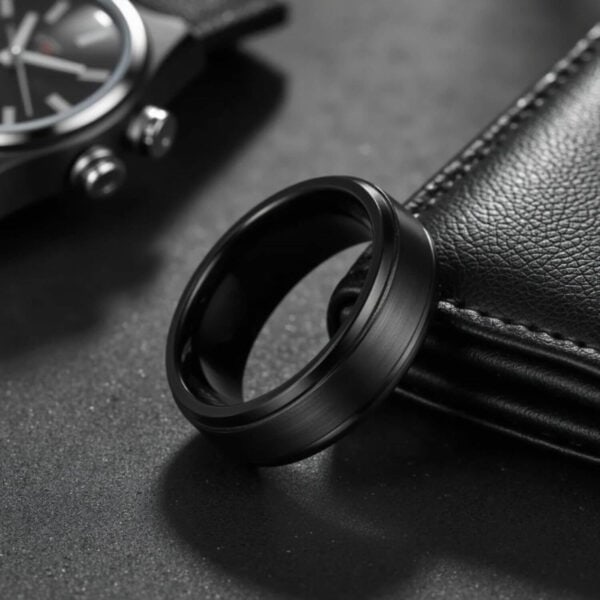 Mans statement ring. Made with tungsten, this black tungsten ring for him is an elegant and stylish fashion piece. And the perfect gift to give to your man to celebrate a wedding, anniversary, or engagement.